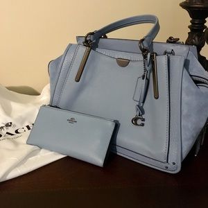 Coach dreamer with wallet